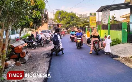 Akhirnya Jalan Dusun Curah Lembu Diaspal pada TMMD di Jember
